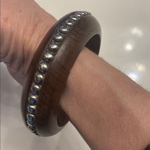 Wood bracelet accented with silver balls